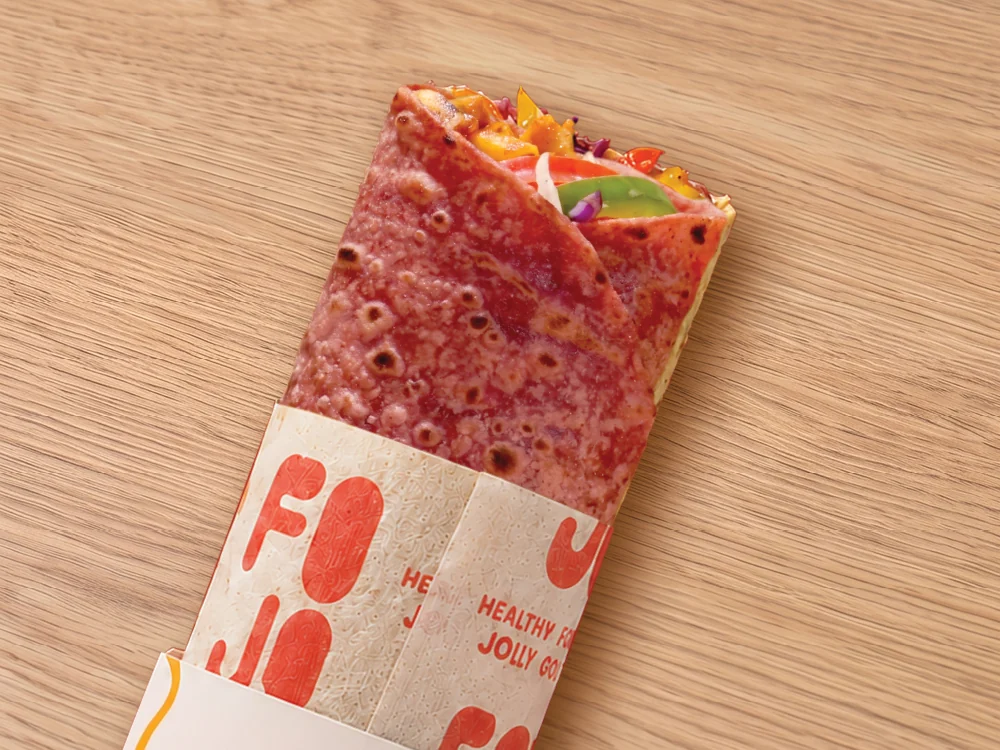 A FOJO wrap in its branded paper sleeve