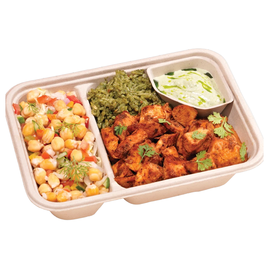A FOJO Joy Bowl tray: chilli chicken, herbed rice and a chickpea salad